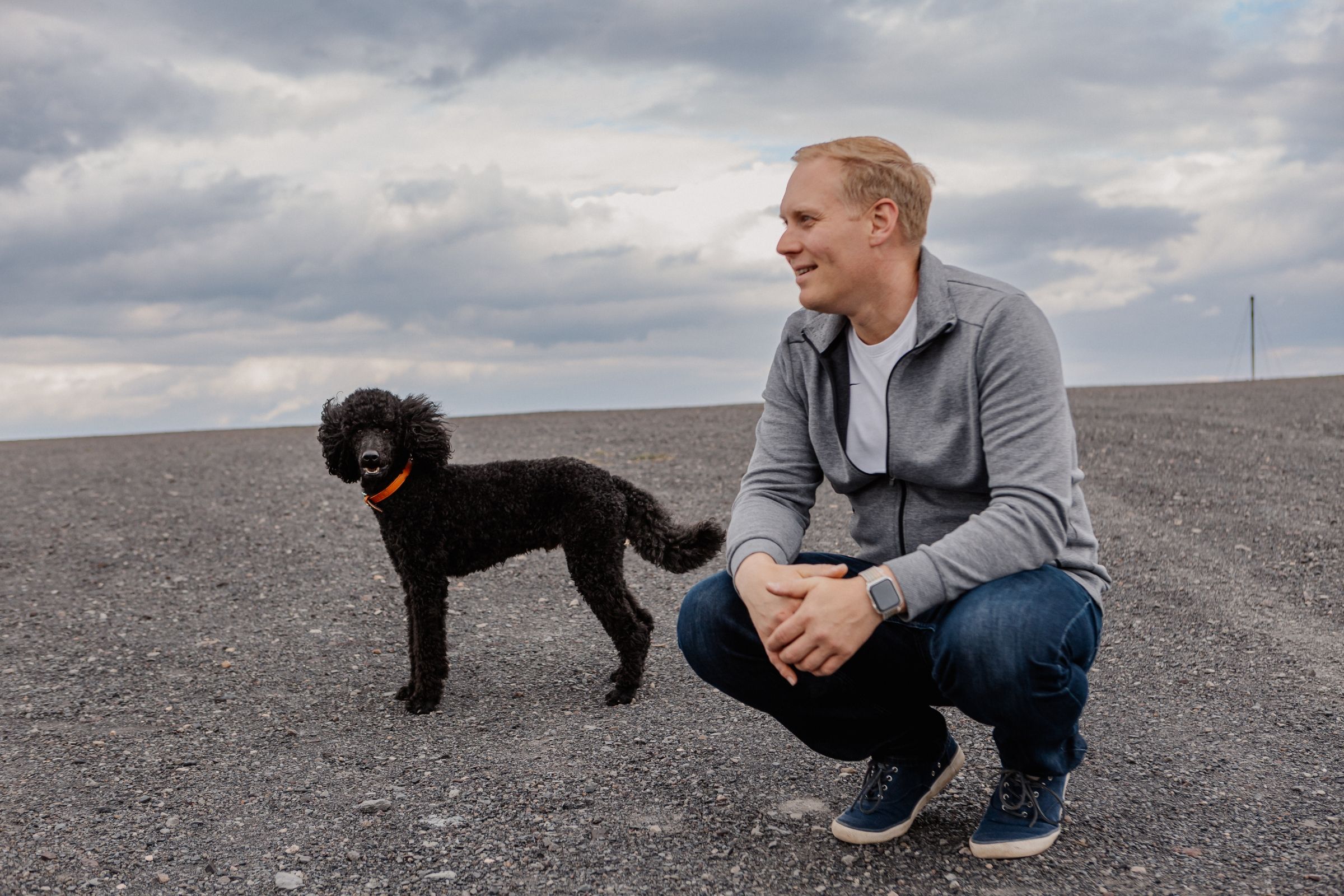 Peter Bonner with his black standard poodle Dasher at the Saarpolygon in Saarland.